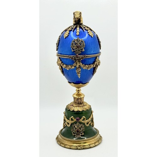722 - A Diamond Set Gilded Silver, Enamel and Nephrite Jade Surprise Egg. Russian Imperial style 'Easter E... 