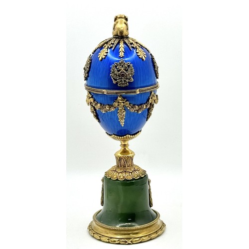 722 - A Diamond Set Gilded Silver, Enamel and Nephrite Jade Surprise Egg. Russian Imperial style 'Easter E... 