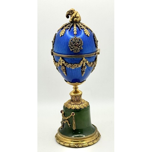 722 - A Diamond Set Gilded Silver, Enamel and Nephrite Jade Surprise Egg. Russian Imperial style 'Easter E... 