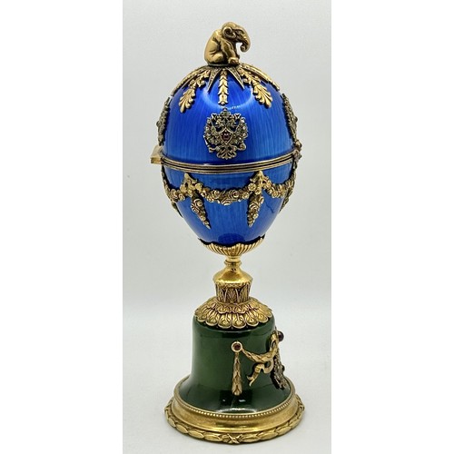722 - A Diamond Set Gilded Silver, Enamel and Nephrite Jade Surprise Egg. Russian Imperial style 'Easter E... 