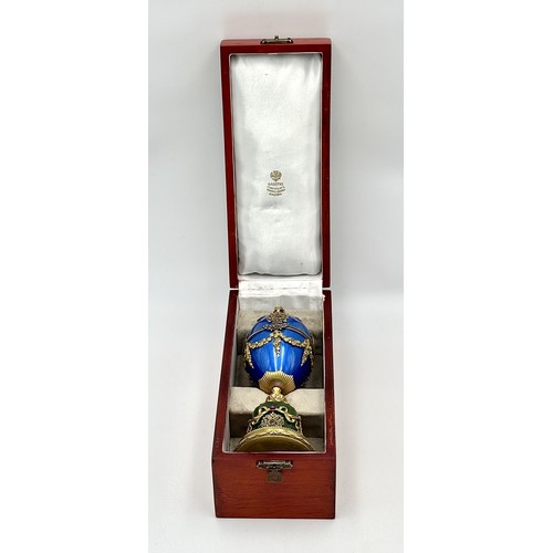 722 - A Diamond Set Gilded Silver, Enamel and Nephrite Jade Surprise Egg. Russian Imperial style 'Easter E... 