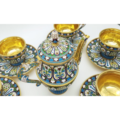 10 - A Large Russian Style Enamelled Silver Gilt Tea Set. Comprising: one tea pot (approx 18cm height), s... 
