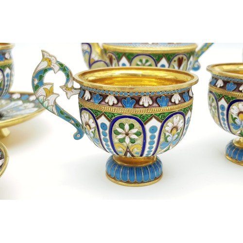 10 - A Large Russian Style Enamelled Silver Gilt Tea Set. Comprising: one tea pot (approx 18cm height), s... 