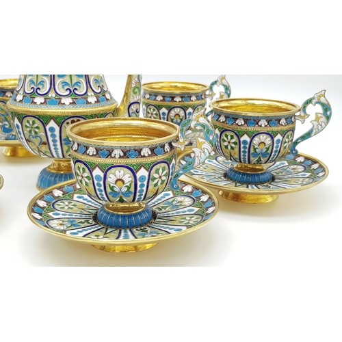 10 - A Large Russian Style Enamelled Silver Gilt Tea Set. Comprising: one tea pot (approx 18cm height), s... 