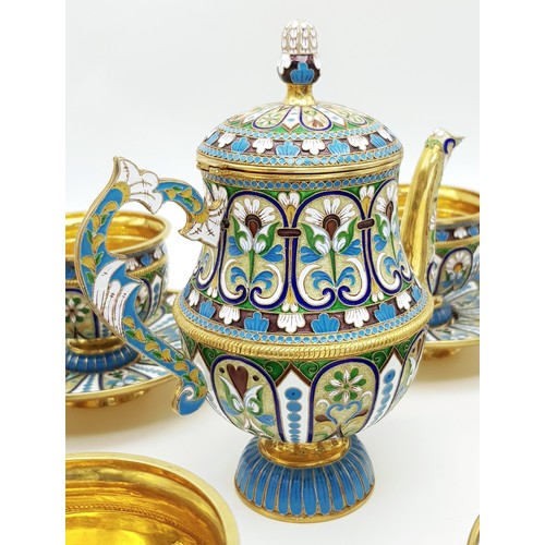 10 - A Large Russian Style Enamelled Silver Gilt Tea Set. Comprising: one tea pot (approx 18cm height), s... 