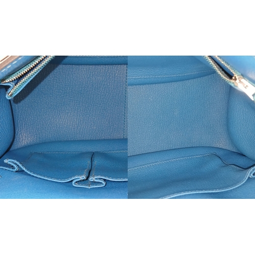 5 - An Hermès Jypsière 31 Handbag. Turquoise pebbled leather exterior with silver-toned hardware, adjust... 