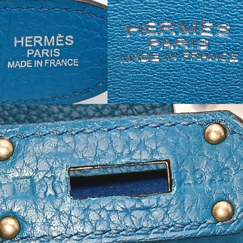 5 - An Hermès Jypsière 31 Handbag. Turquoise pebbled leather exterior with silver-toned hardware, adjust... 