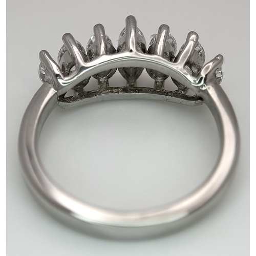 15 - An 18K White Gold Marquise Cut Seven Stone Diamond Ring. Circa 1ctw diamonds. Ring size M. 5.58g tot... 