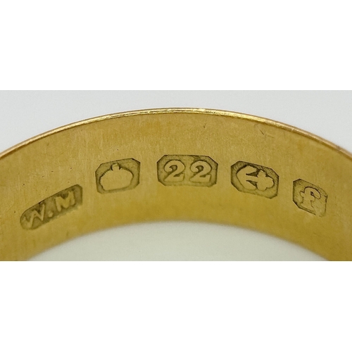 16 - A 22K Yellow Gold Wedding Band. 5.7mm Band Width, Size P/Q. Total Weight 4.41 Grams.