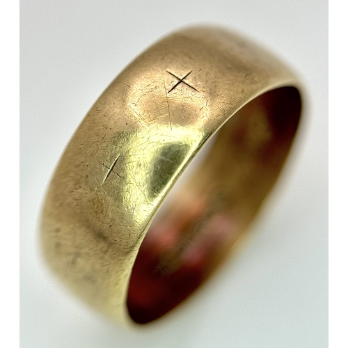 44 - A 9K Yellow Gold Wedding Band. 6.6mm Band Width, Size R. Total Weight 3.11 Grams.