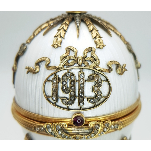 51 - A Russian Style Diamond Set Gilded Silver and Enamel Surprise Egg. Russian Imperial style ‘Easter Eg... 