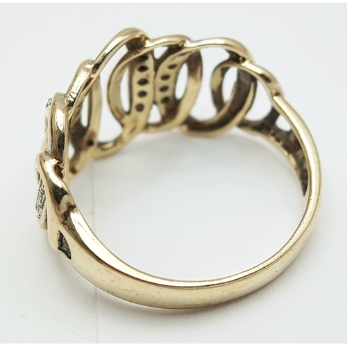 503 - A 9K YELLOW GOLD, DIAMOND SET, CIRCLES DESIGN RING. 3.4G, SIZE P. SC 5032