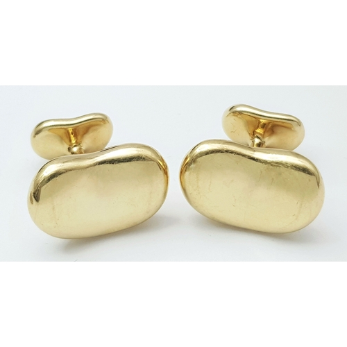 6 - A PAIR OF TIFFANY AND CO, ELSA PERETTI, 18K YELLOW GOLD, BEAN CUFFLINKS. 23.8G. TAN 5005.
