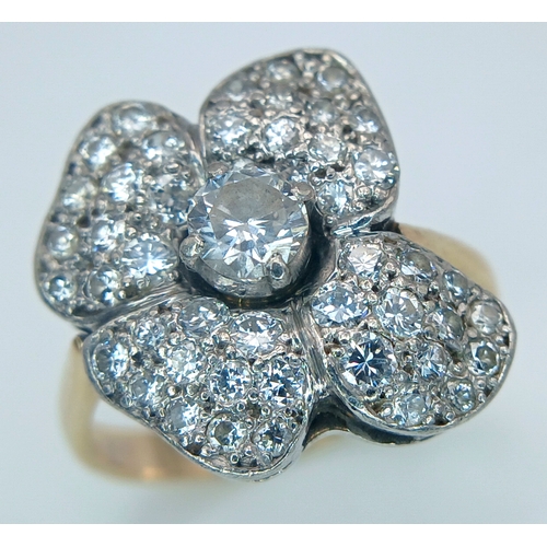 48 - AN 14K YELLOW GOLD, DIAMOND SET, FANCY FLOWER DESIGN RING. 1.50CTW. 5.2G, SIZE M/N. TAN 5003