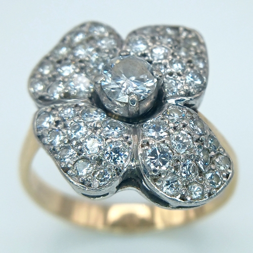 48 - AN 14K YELLOW GOLD, DIAMOND SET, FANCY FLOWER DESIGN RING. 1.50CTW. 5.2G, SIZE M/N. TAN 5003