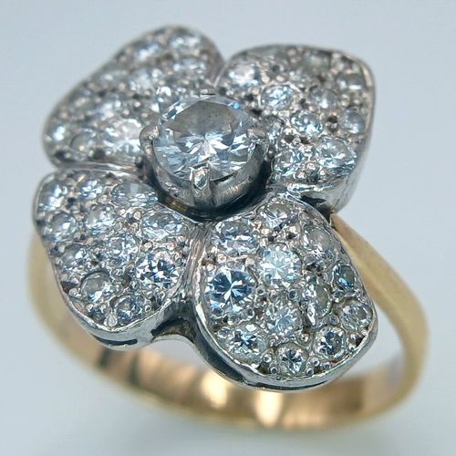48 - AN 14K YELLOW GOLD, DIAMOND SET, FANCY FLOWER DESIGN RING. 1.50CTW. 5.2G, SIZE M/N. TAN 5003