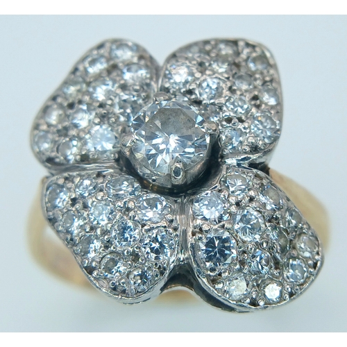 48 - AN 14K YELLOW GOLD, DIAMOND SET, FANCY FLOWER DESIGN RING. 1.50CTW. 5.2G, SIZE M/N. TAN 5003