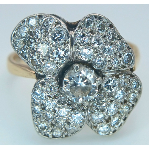 48 - AN 14K YELLOW GOLD, DIAMOND SET, FANCY FLOWER DESIGN RING. 1.50CTW. 5.2G, SIZE M/N. TAN 5003