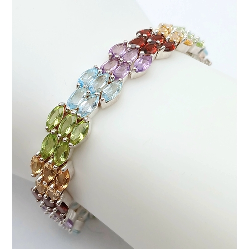 501 - A Beautiful Sterling Silver Blue Topaz, Peridot, Citrine, Garnet and Amethyst Multi-Row Tennis Brace... 