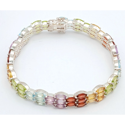 501 - A Beautiful Sterling Silver Blue Topaz, Peridot, Citrine, Garnet and Amethyst Multi-Row Tennis Brace... 