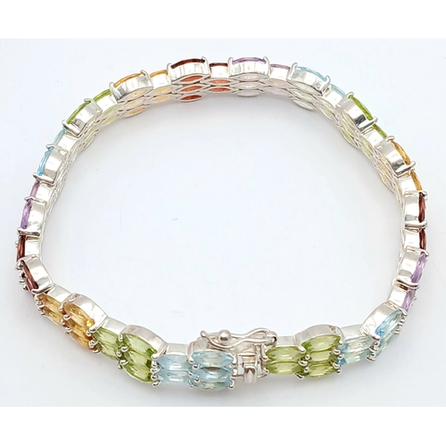 501 - A Beautiful Sterling Silver Blue Topaz, Peridot, Citrine, Garnet and Amethyst Multi-Row Tennis Brace... 