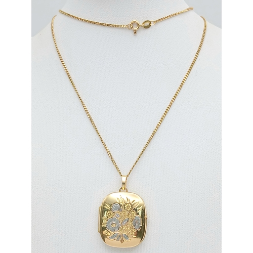 22 - A 9K GOLD LOCKET PENDANT ON A 56cms 9K GOLD NECK CHAIN WITH NICELY DECORATED FRONT AND UNUSUAL SQUAR... 