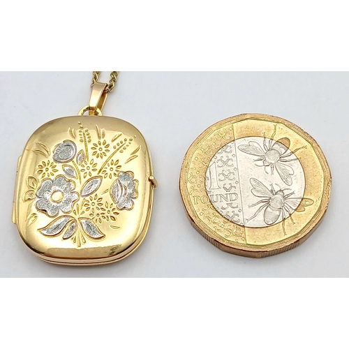 22 - A 9K GOLD LOCKET PENDANT ON A 56cms 9K GOLD NECK CHAIN WITH NICELY DECORATED FRONT AND UNUSUAL SQUAR... 