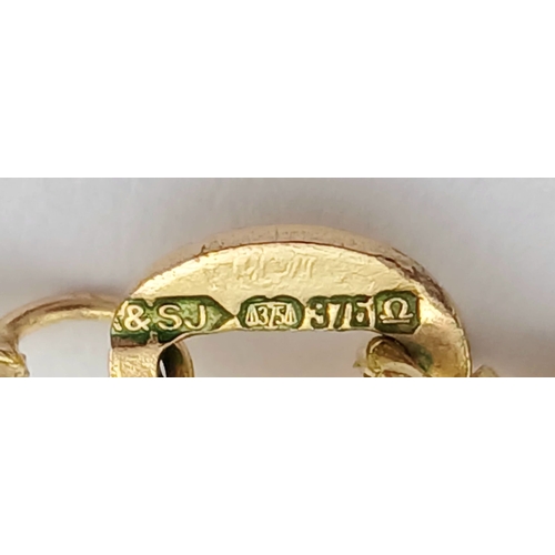 22 - A 9K GOLD LOCKET PENDANT ON A 56cms 9K GOLD NECK CHAIN WITH NICELY DECORATED FRONT AND UNUSUAL SQUAR... 