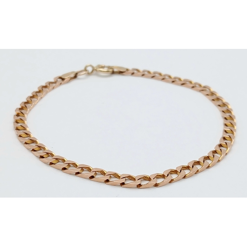 29 - A 9K ROSEGOLD CURB LINK BRACELET .      4.2gms    19cms