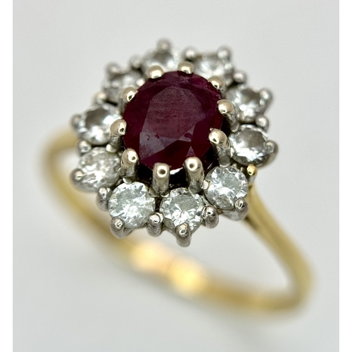 3 - AN 18K GOLD RING WITH RUBY CENTRE STONE SURROUNDED BY QUALITY DIAMONDS .        3.8gms    size O/P
