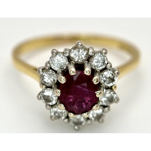 3 - AN 18K GOLD RING WITH RUBY CENTRE STONE SURROUNDED BY QUALITY DIAMONDS .        3.8gms    size O/P