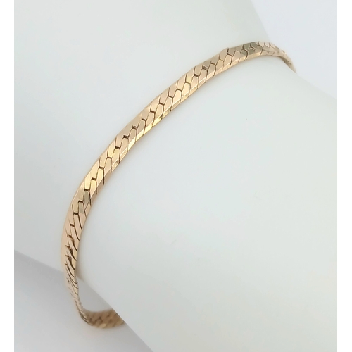 43 - A CLASSIC 9K GOLD HERRINGBONE LINK BRACELET .      4.8gms         19cms