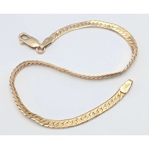 43 - A CLASSIC 9K GOLD HERRINGBONE LINK BRACELET .      4.8gms         19cms
