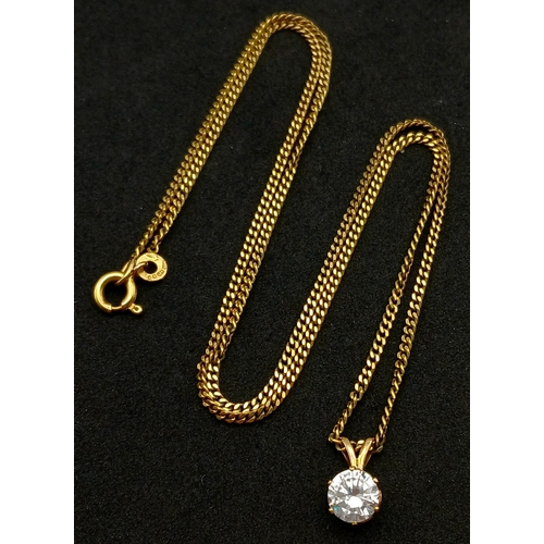 548 - A 9K GOLD NECK CHAIN WITH A CZ PENDANT.    3.7gms    44cms