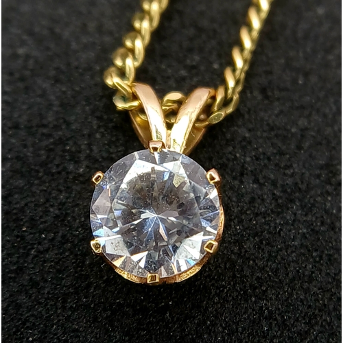 548 - A 9K GOLD NECK CHAIN WITH A CZ PENDANT.    3.7gms    44cms