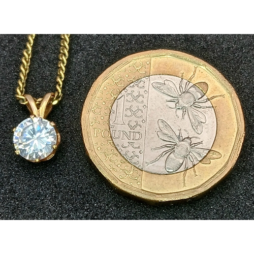 548 - A 9K GOLD NECK CHAIN WITH A CZ PENDANT.    3.7gms    44cms