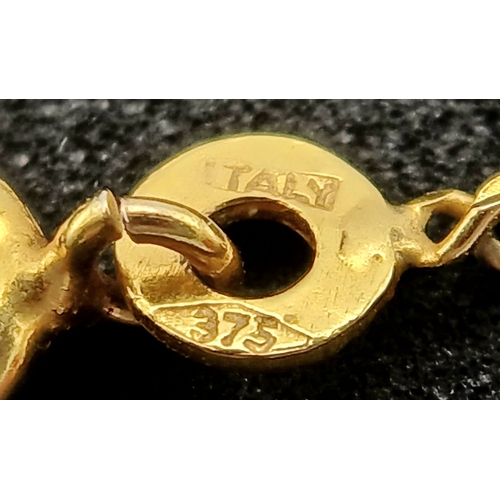 548 - A 9K GOLD NECK CHAIN WITH A CZ PENDANT.    3.7gms    44cms