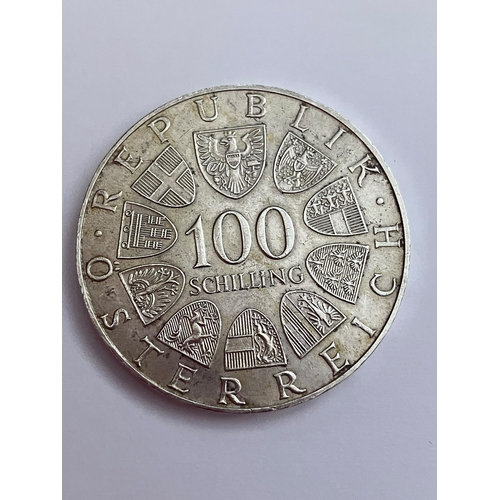 518 - 1976 AUSTRIAN SILVER 100 SCHILLING COIN. Very Fine Condition. Having bold raised definition to both ... 