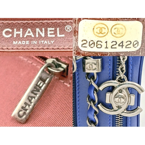 33 - A Chanel Blue Quilted Leather Camera Bag. Blue leather exterior with silver-toned hardware, chain an... 