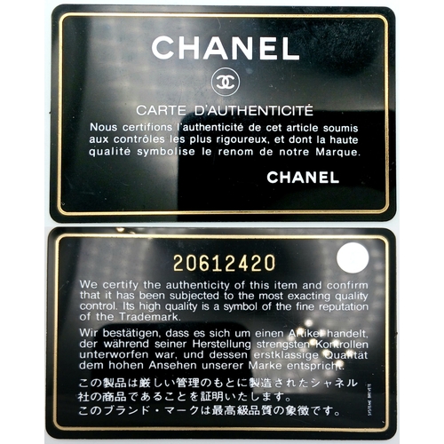 33 - A Chanel Blue Quilted Leather Camera Bag. Blue leather exterior with silver-toned hardware, chain an... 