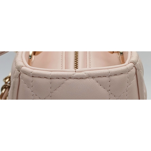 12 - A Christian Dior Blush Pink Cannage Quilted Leather Lady Dior Handbag. Blush pink leather exterior w... 