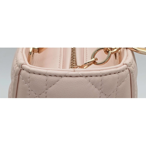 12 - A Christian Dior Blush Pink Cannage Quilted Leather Lady Dior Handbag. Blush pink leather exterior w... 