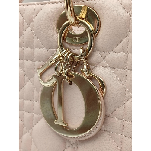 12 - A Christian Dior Blush Pink Cannage Quilted Leather Lady Dior Handbag. Blush pink leather exterior w... 