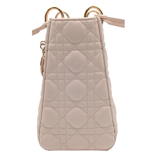 12 - A Christian Dior Blush Pink Cannage Quilted Leather Lady Dior Handbag. Blush pink leather exterior w... 