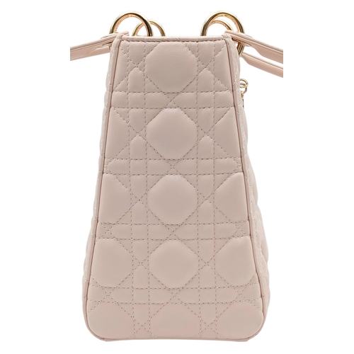 12 - A Christian Dior Blush Pink Cannage Quilted Leather Lady Dior Handbag. Blush pink leather exterior w... 