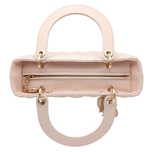 12 - A Christian Dior Blush Pink Cannage Quilted Leather Lady Dior Handbag. Blush pink leather exterior w... 