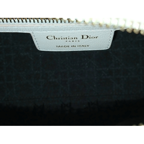 12 - A Christian Dior Blush Pink Cannage Quilted Leather Lady Dior Handbag. Blush pink leather exterior w... 