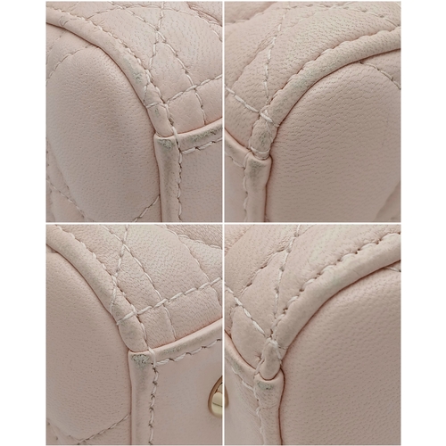 12 - A Christian Dior Blush Pink Cannage Quilted Leather Lady Dior Handbag. Blush pink leather exterior w... 