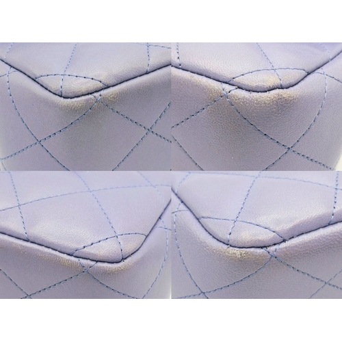 61 - A Chanel Classic Jumbo Quilted Double Flap Bag. Muted lilac diamond-quilted lambskin leather exterio... 