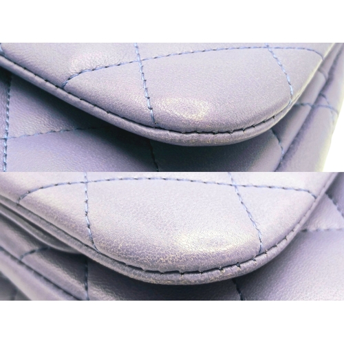 61 - A Chanel Classic Jumbo Quilted Double Flap Bag. Muted lilac diamond-quilted lambskin leather exterio... 